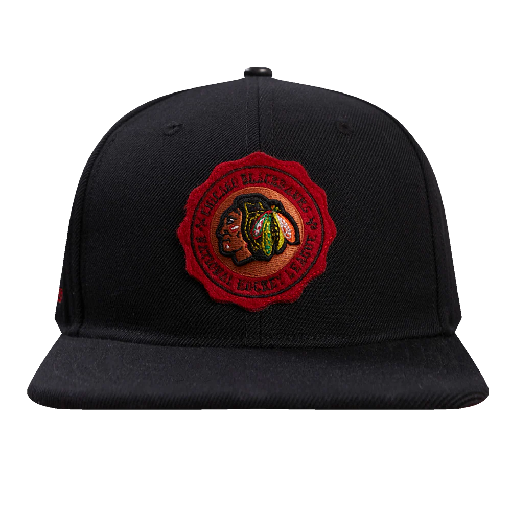 NHL CHICAGO BLACKHAWKS CREST EMBLEM WOOL SNAPBACK HAT (BLACK)